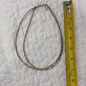 Clear and gold bead necklace